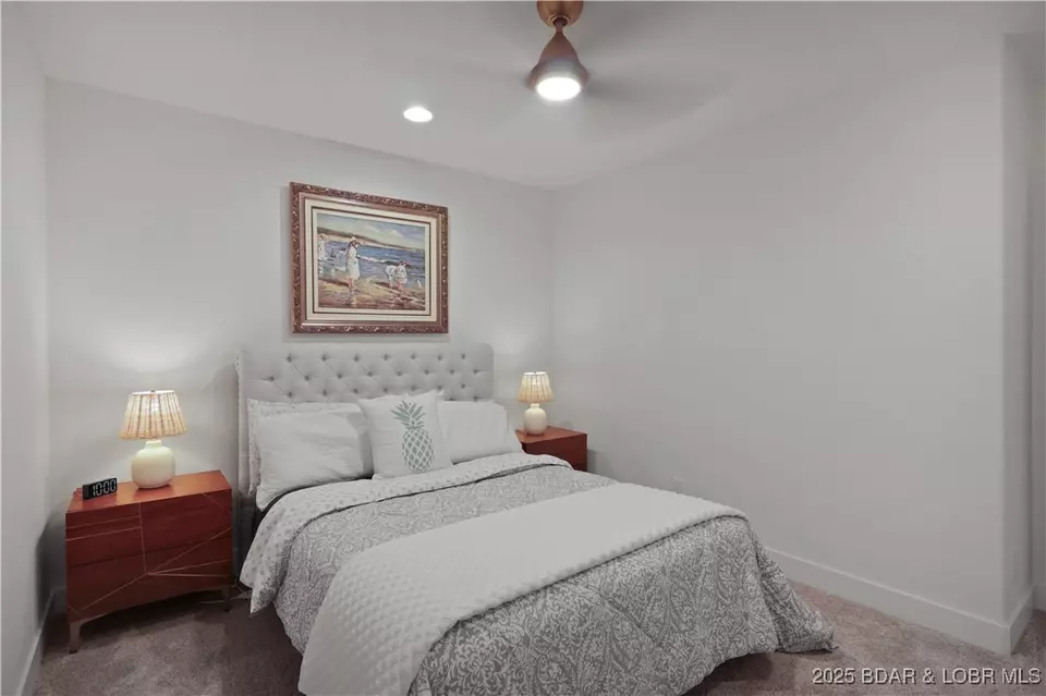 Bedroom - 1603 Grand View Dr, Sunrise Beach, MO 65079 photo 10 of 11