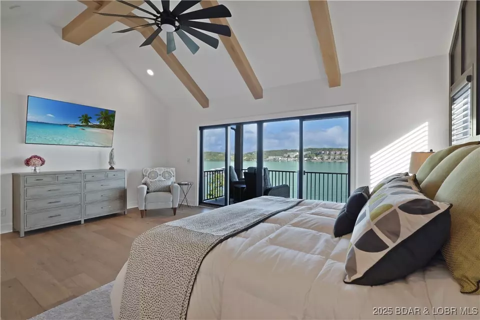 Bedroom - 1603 Grand View Dr, Sunrise Beach, MO 65079 photo 4 of 11