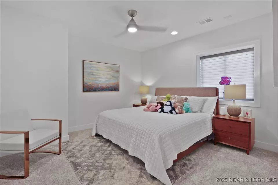 Bedroom - 1603 Grand View Dr, Sunrise Beach, MO 65079 photo 9 of 11
