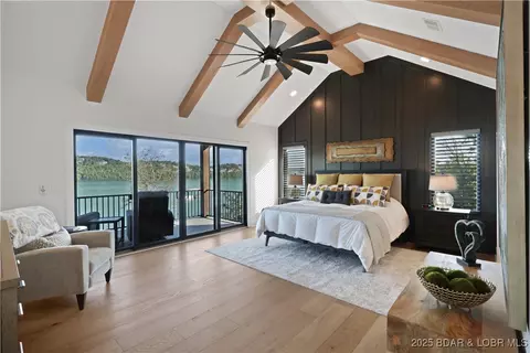 Bedroom - 1603 Grand View Dr, Sunrise Beach, MO 65079 photo 1 of 11