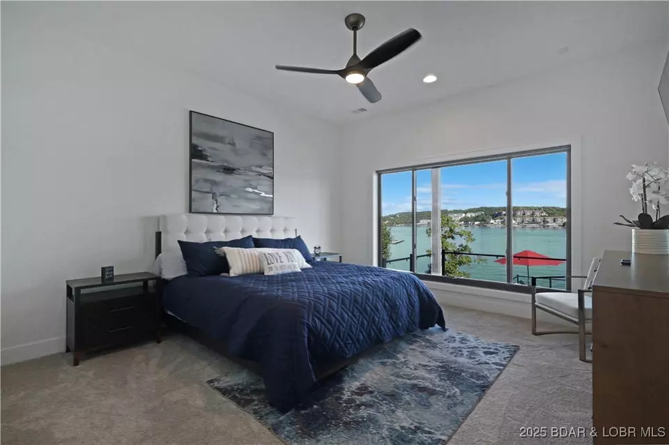 Bedroom - 1603 Grand View Dr, Sunrise Beach, MO 65079 photo 6 of 11