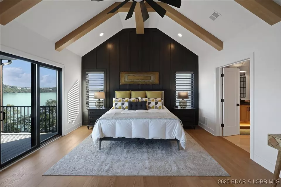 Bedroom - 1603 Grand View Dr, Sunrise Beach, MO 65079 photo 2 of 11