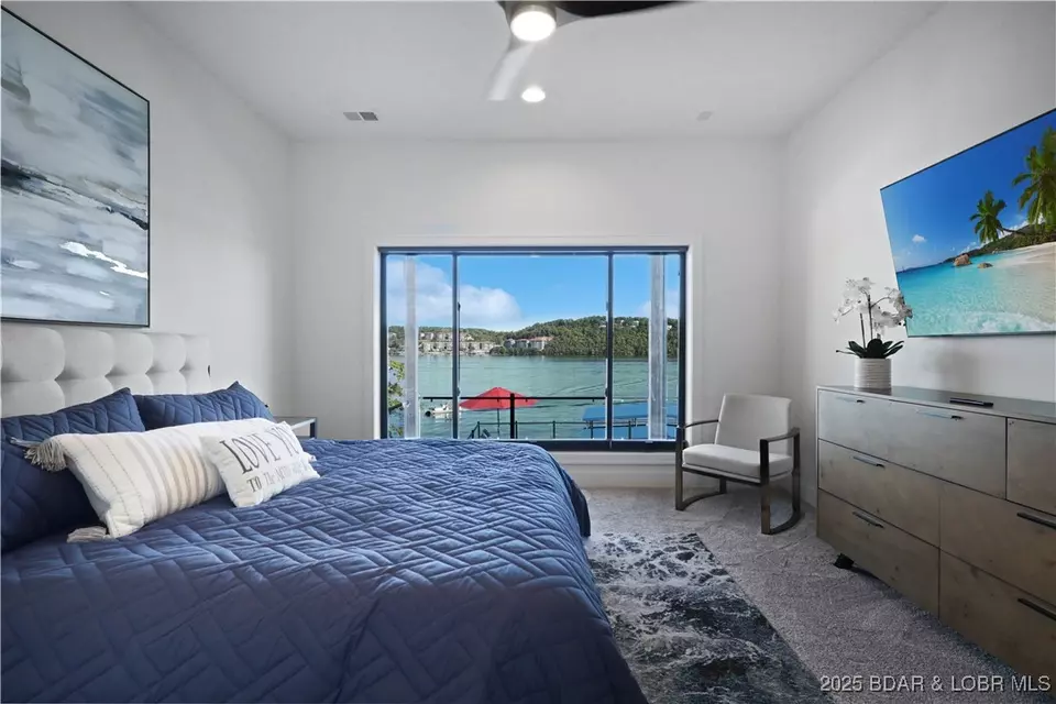 Bedroom - 1603 Grand View Dr, Sunrise Beach, MO 65079 photo 7 of 11