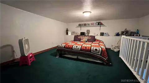 Bedroom - 134 W 8th St, Eldon, MO 65026 photo 2 of 7