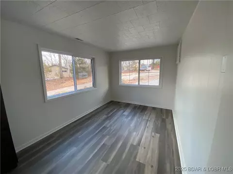 Living - 10 Legacy Ln E, Sunrise Beach, MO 65079 photo 5 of 6
