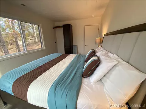 Bedroom - 10 Legacy Ln E, Sunrise Beach, MO 65079 photo 2 of 3