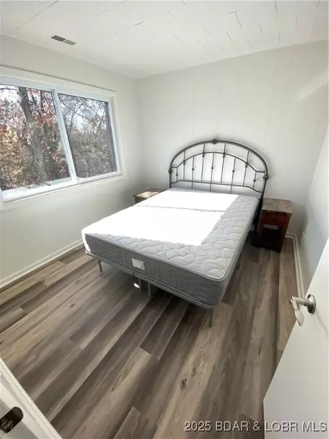 Bedroom - 10 Legacy Ln E, Sunrise Beach, MO 65079 photo 3 of 3