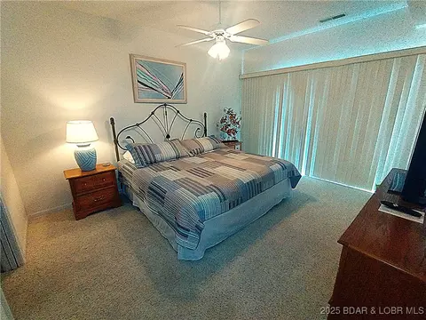 Bedroom - 910 E Harbour Towne Dr #E-910, Lake Ozark, MO 65049 photo 1 of 7