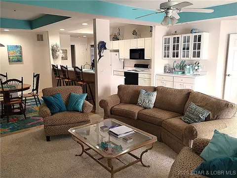 Living - 910 E Harbour Towne Dr #E-910, Lake Ozark, MO 65049 photo 4 of 4