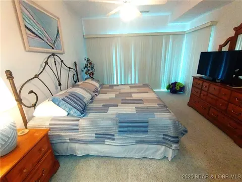 Bedroom - 910 E Harbour Towne Dr #E-910, Lake Ozark, MO 65049 photo 2 of 7