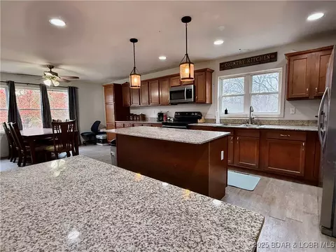 Kitchen - 50 Cave Dr, Eldon, MO 65026 photo 4 of 5