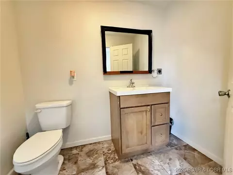 Bath - 50 Cave Dr, Eldon, MO 65026 photo 3 of 4