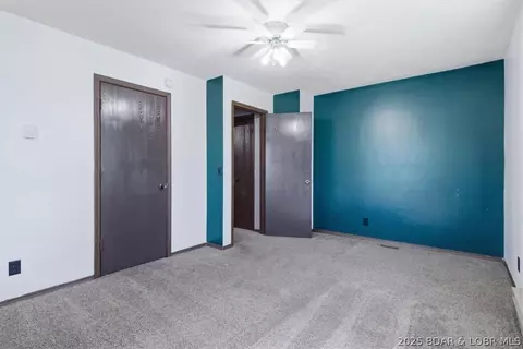 Bedroom - 807 Rollotrend Ln, Eldon, MO 65026 photo 5 of 7