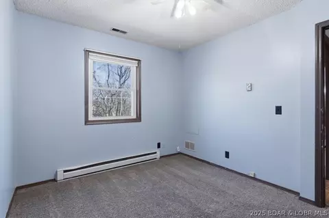 Bedroom - 807 Rollotrend Ln, Eldon, MO 65026 photo 2 of 7