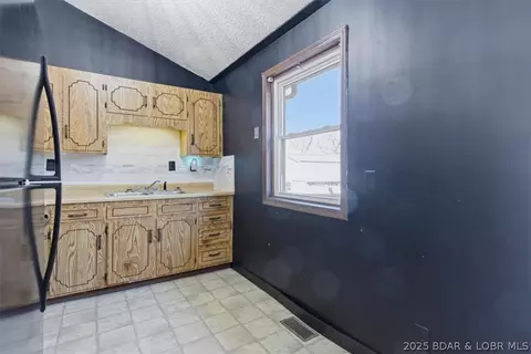Kitchen - 807 Rollotrend Ln, Eldon, MO 65026 photo 2 of 2