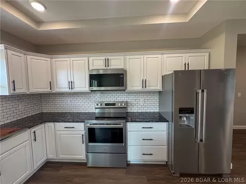 Kitchen - 135 Mcdonald Ave, Versailles, MO 65084 photo 3 of 5