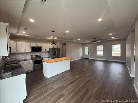 Living - 135 Mcdonald Ave, Versailles, MO 65084 photo 2 of 4