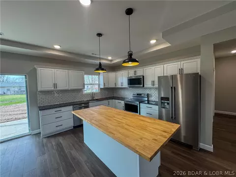 Kitchen - 135 Mcdonald Ave, Versailles, MO 65084 photo 2 of 5