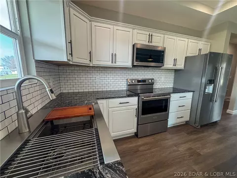 Kitchen - 135 Mcdonald Ave, Versailles, MO 65084 photo 5 of 5