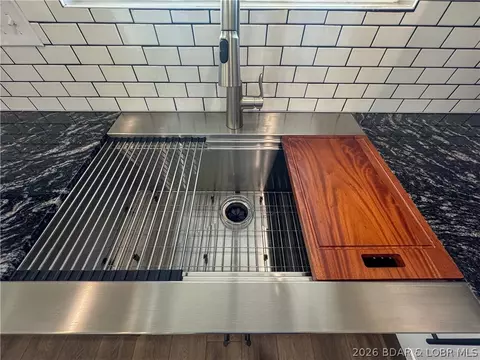 Kitchen - 135 Mcdonald Ave, Versailles, MO 65084 photo 4 of 5
