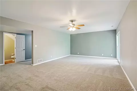 Living - 1380 Bluff Dr, Osage Beach, MO 65065 photo 8 of 9