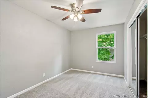 Bedroom - 1380 Bluff Dr, Osage Beach, MO 65065 photo 1 of 4