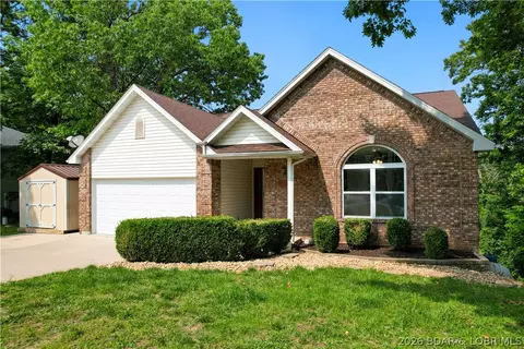 Exterior - 1380 Bluff Dr, Osage Beach, MO 65065 photo 5 of 9