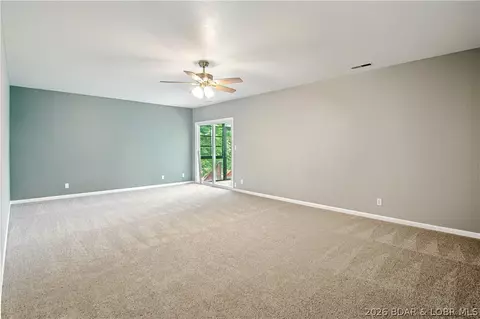 Living - 1380 Bluff Dr, Osage Beach, MO 65065 photo 6 of 9