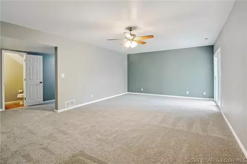 Living - 1380 Bluff Dr, Osage Beach, MO 65065 photo 7 of 9
