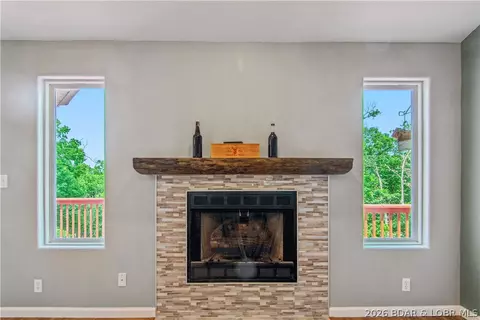 Living - 1380 Bluff Dr, Osage Beach, MO 65065 photo 4 of 9