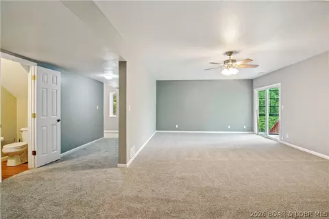 Living - 1380 Bluff Dr, Osage Beach, MO 65065 photo 5 of 9