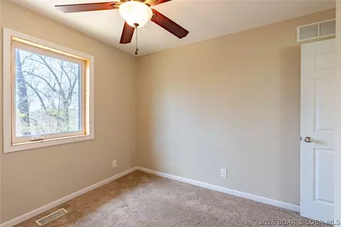 Bedroom - 4 Kiefer Rd, Lake Ozark, MO 65049 photo 7 of 11