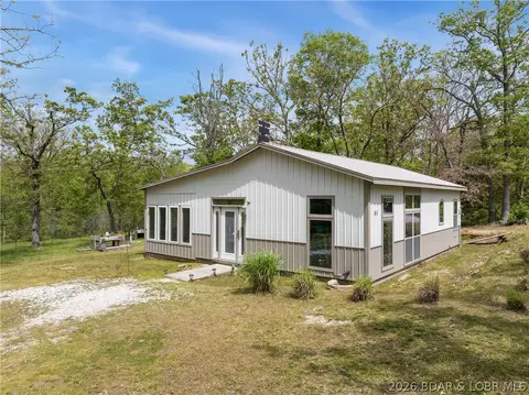 65 Log Cabin Rd, Macks Creek, MO 65786