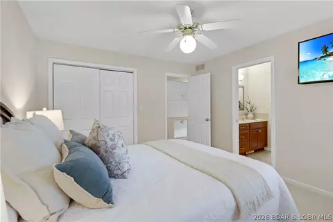 Bedroom - 520 Eagle Dr, Lake Ozark, MO 65049 photo 7 of 12