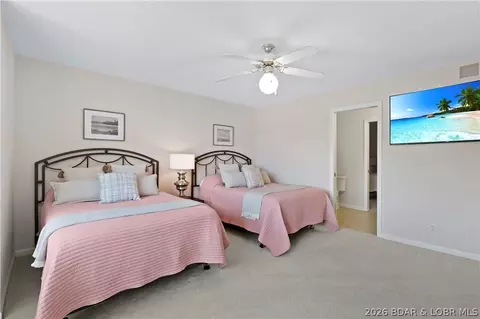 Bedroom - 520 Eagle Dr, Lake Ozark, MO 65049 photo 10 of 12