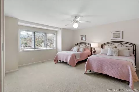Bedroom - 520 Eagle Dr, Lake Ozark, MO 65049 photo 8 of 12