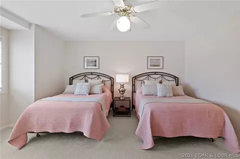 Bedroom - 520 Eagle Dr, Lake Ozark, MO 65049 photo 9 of 12