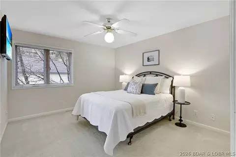 Bedroom - 520 Eagle Dr, Lake Ozark, MO 65049 photo 5 of 12
