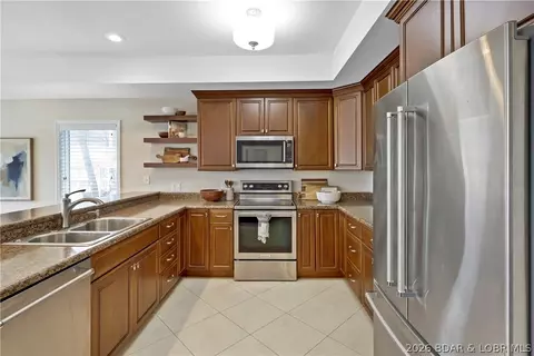 Kitchen - 520 Eagle Dr, Lake Ozark, MO 65049 photo 3 of 3