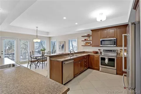 Kitchen - 520 Eagle Dr, Lake Ozark, MO 65049 photo 2 of 3