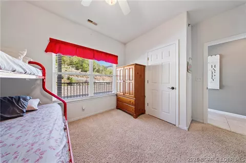 Bedroom - 164 Windgate Dr #4B, Sunrise Beach, MO 65079 photo 5 of 7
