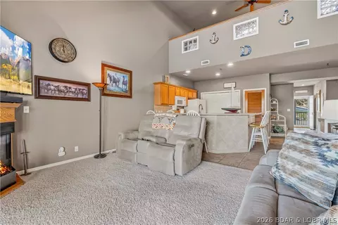 Living - 164 Windgate Dr #4B, Sunrise Beach, MO 65079 photo 2 of 3