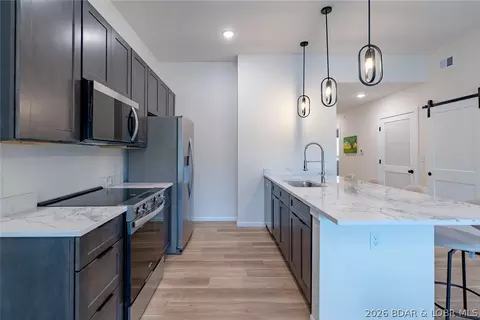 Kitchen - 700 Pershing Dr # 202, Camdenton, MO 65020 photo 3 of 3