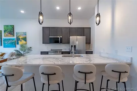 Kitchen - 700 Pershing Dr # 202, Camdenton, MO 65020 photo 2 of 3