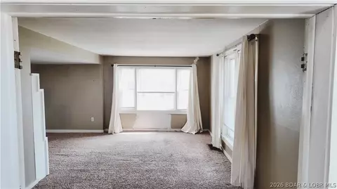 Living - 112 Aurora St, Eldon, MO 65026 photo 2 of 3