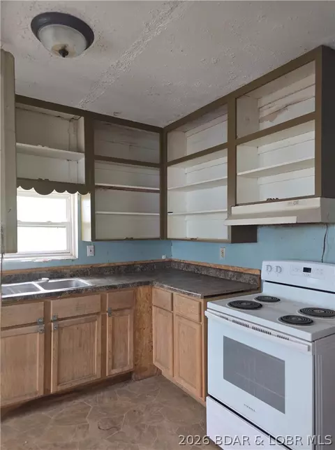 Kitchen - 214 S Grand Ave, Eldon, MO 65026 photo 1 of 1