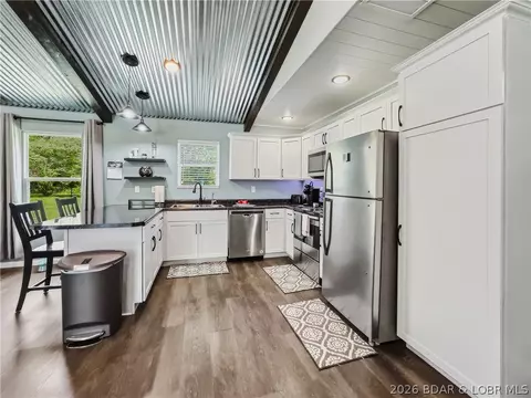 Kitchen - 203 W 7th St, Eldon, MO 65026 photo 1 of 3