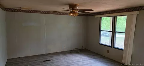 Living - 3509 Doc Ridgeway Rd, Roach, MO 65787 photo 2 of 2