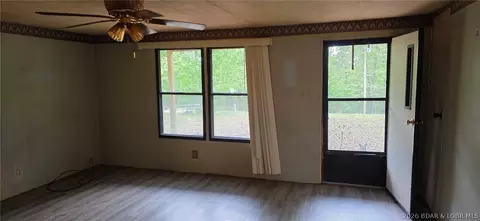 Living - 3509 Doc Ridgeway Rd, Roach, MO 65787 photo 1 of 2