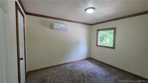 Bedroom - 205 S Maple St, Versailles, MO 65084 photo 2 of 3